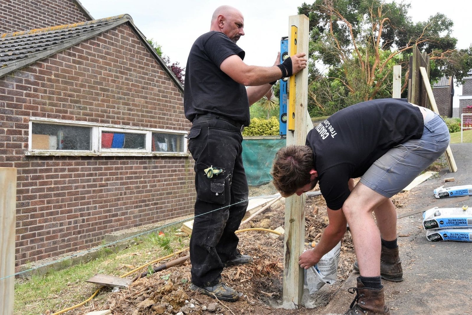 concreting the posts Garden fencing Weymouth, Weymouth fencing specialists, fencing, featherboard, Weymouth, Weymouth fencing, fencing specialists